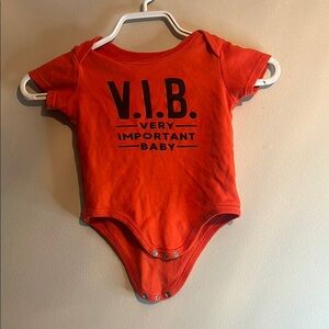 Vibrant Red Bodysuit One Piece with Playful Print